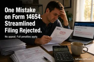Man reviewing IRS streamlined filing rejection letter with Form 14654 tax documents and penalty calculator on office desk