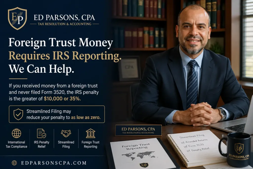 Ed Parsons, CPA, sitting at desk with documents about foreign trust money and IRS reporting, emphasizing streamlined filing and tax compliance.